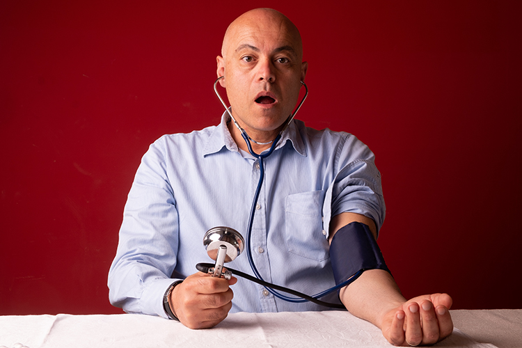 Person alarmed by blood pressure reading