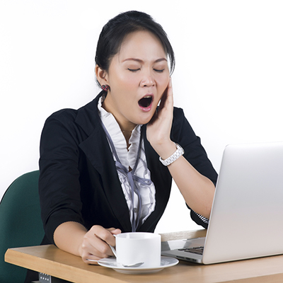 A person yawning, an example of a subtle overbreathing behavior