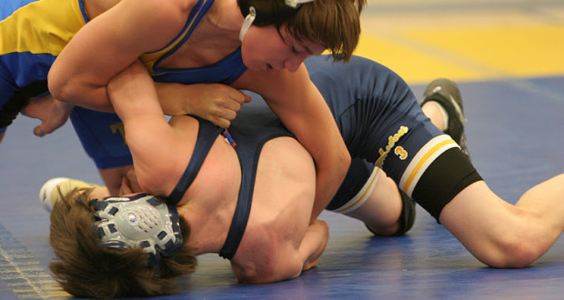 Wrestlers with skin lesions